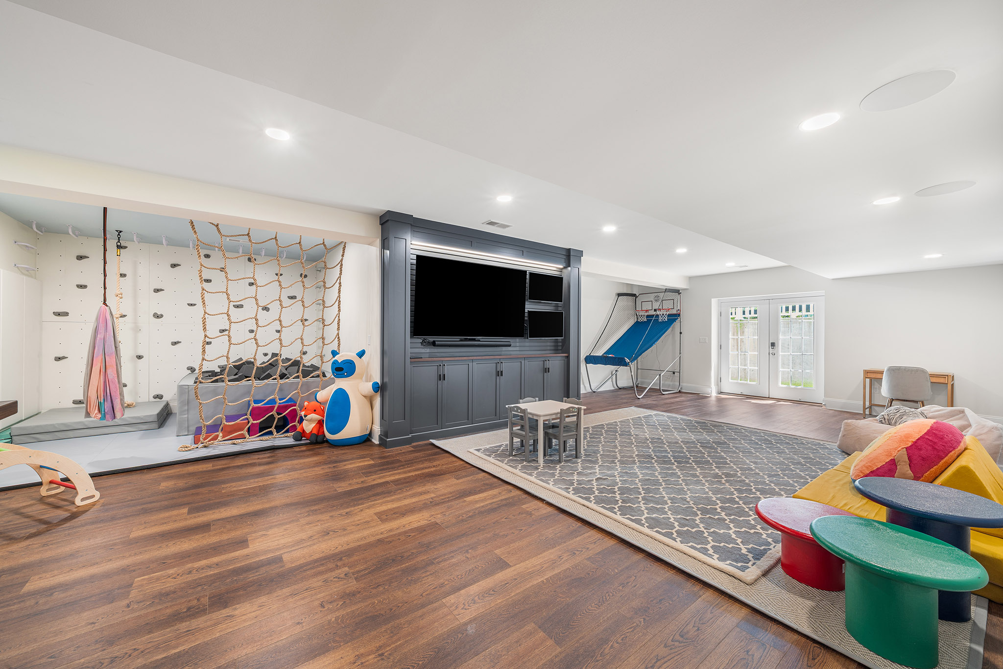 Domers Construction - Integrated and transformed unfinished garage and basement into indoor play area, mudroom, home gym, home brew bar, office, bathroom and bedroom