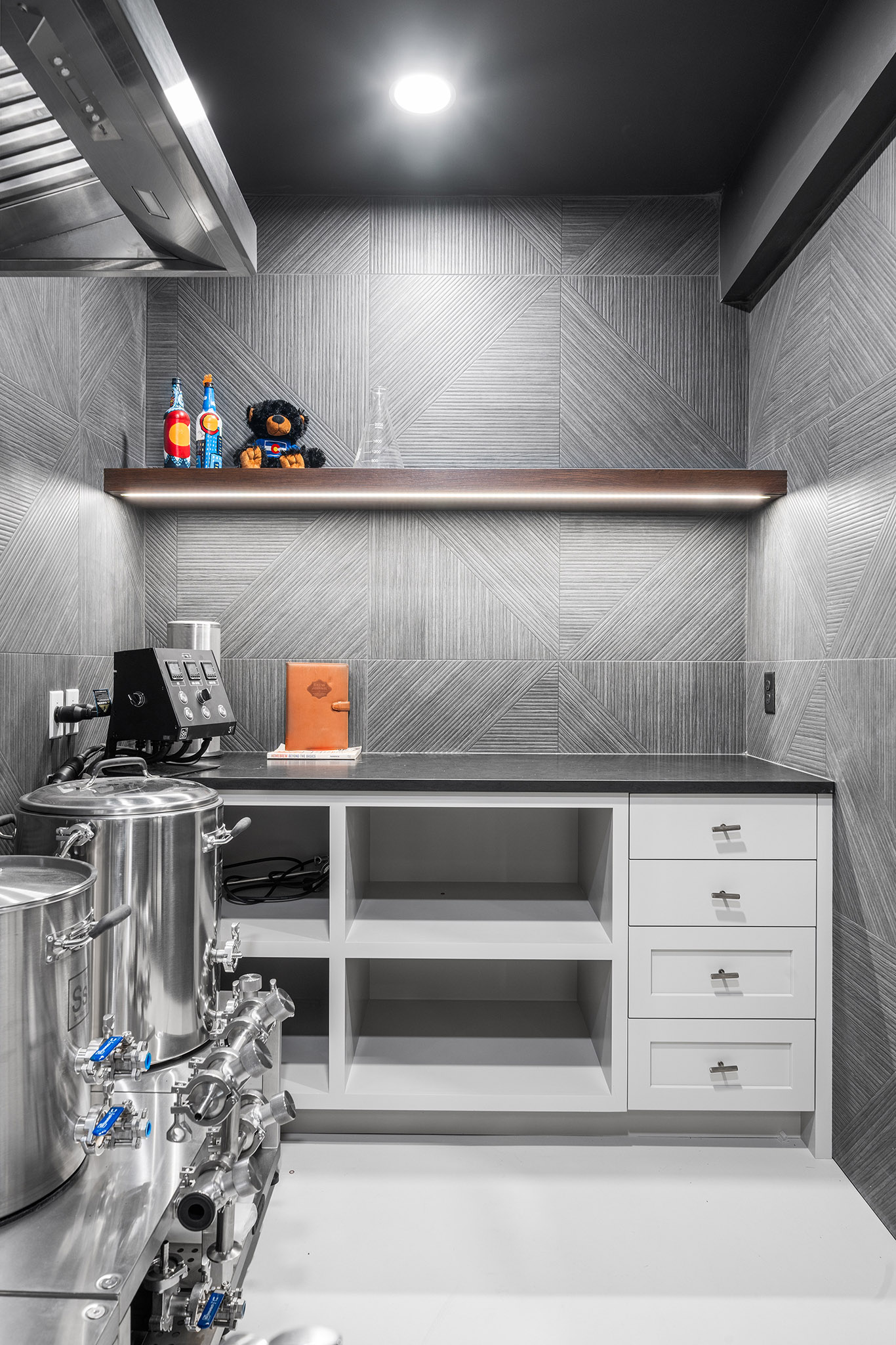 Domers Construction - Integrated and transformed unfinished garage and basement into indoor play area, mudroom, home gym, home brew bar, office, bathroom and bedroom